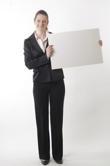 young businesswoman with white sign