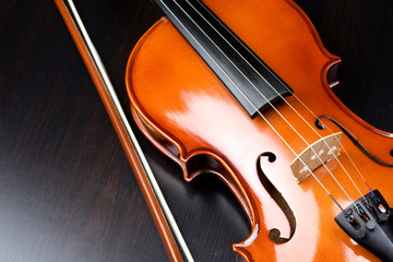 Violin on a dark desk