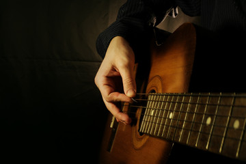 guitar at black background
