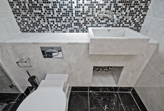 marble bathroom with mosaic tiles