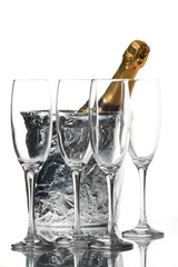 Champagne flutes and ice bucket