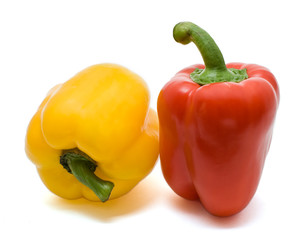 red and yellow bell peppers isolated on a white background