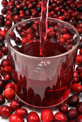 sweet organic cranberries and juice in a glass