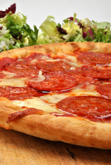 home made italian pizza with salami and cheese