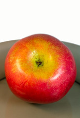 Red apple on a plate