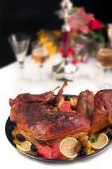 Roast rabbit with herbs and potatoes