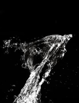 Stylish water splash. Isolated on black background