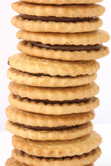 Stack of shortbread butter biscuits with chocolate filling
