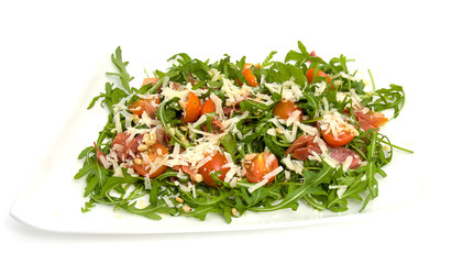 Fresh lettuce with tomatoes over white background