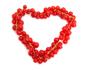 red berries in the shape of hearts over white background