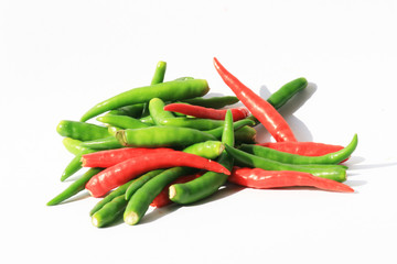 Red and green chili peppers isolated on white, Thailand.