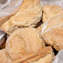 Fresh breads or rolls surrounded by plastic