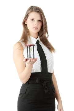 Young business woman with hourglass