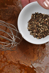 add some organic black pepper into a sauce