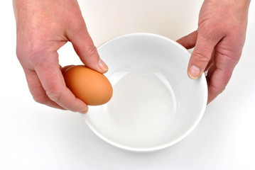 open one organic egg to separate egg yolk