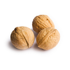 Walnuts in closeup in a white background