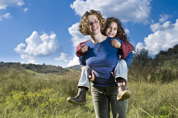 mother girl piggyback