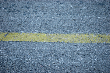 asphalt and yellow line