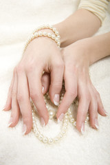 beautiful hands with perfect wet french manicure