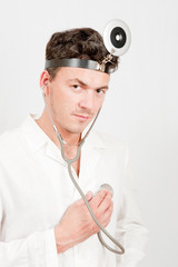 Young handsome male doctor with stethoscope
