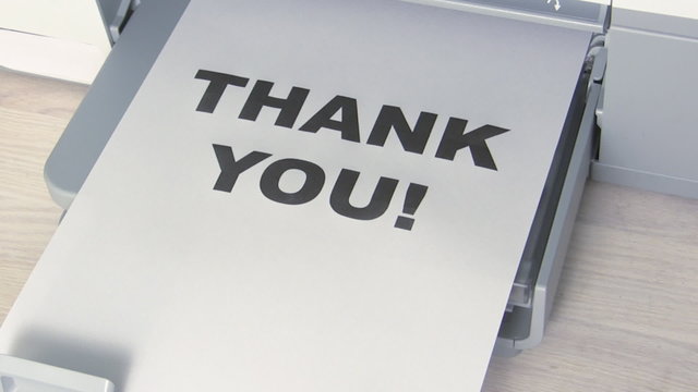 Ink printer printing "thank you" notice
