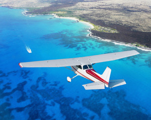 small plane cruising - Powered by Adobe