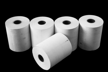 White paper reels isolated on black background
