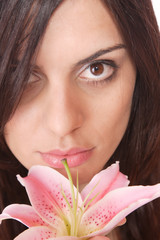 Fototapeta premium Beautiful woman with flower isolated on white