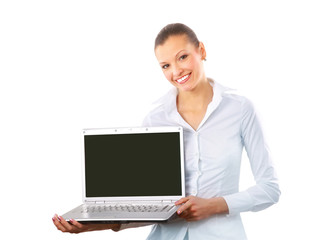 pretty business woman looking at laptop.