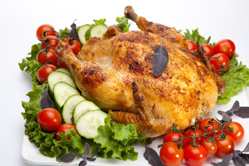 Whole roasted chicken on white
