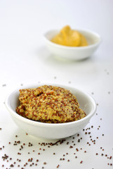 some organic mustard in a white bowl