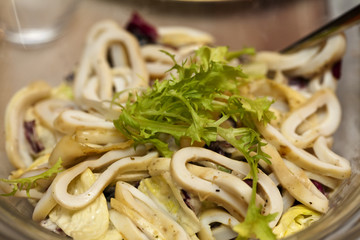 rings of squid with rucolla
