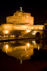 Fototapeta na wymiar The night view of Castle Saint Angel in Rome, Italy