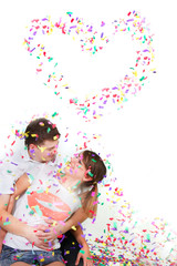 happy loving couple in confetti over white