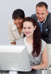 Fototapeta premium Business people working together at a computer