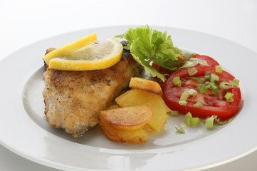 carp on organic lemon and healthy vegetable