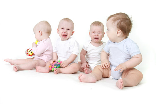 several babies over white