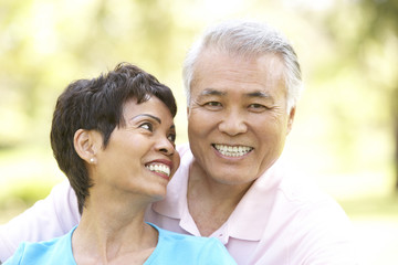 Fototapeta premium Portrait Of Senior Couple In Park