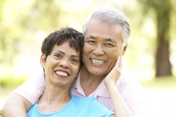 Obraz premium Portrait Of Senior Couple In Park
