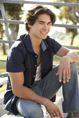 Teenage Boy Sitting On Steps