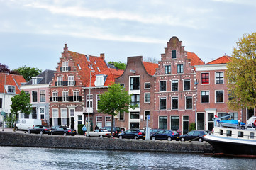 Typical dutch houses alongside canal. Haarlem, Netherlands.