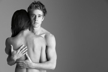 Naked Young Couple Embracing