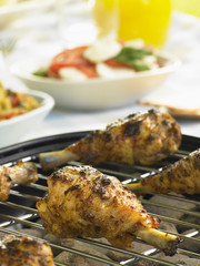 Chicken Cooking On A Grill
