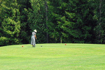 GOLFER AT COUNTRY CLUB