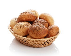 Buns with sesame in a woven basket
