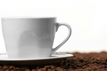 Cup with coffee, costing on coffee grain