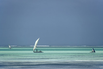 Boats in turqoise water, Zanzibar