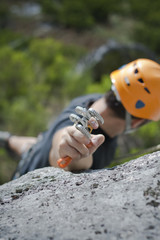 Man climbing a mountain