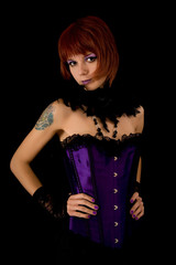 Young girl in purple corset