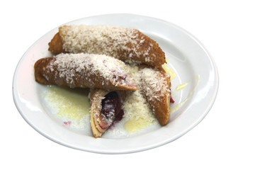 pancakes with cherry and jam on plate